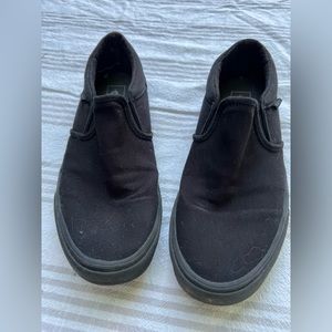 Black slip-on Vans